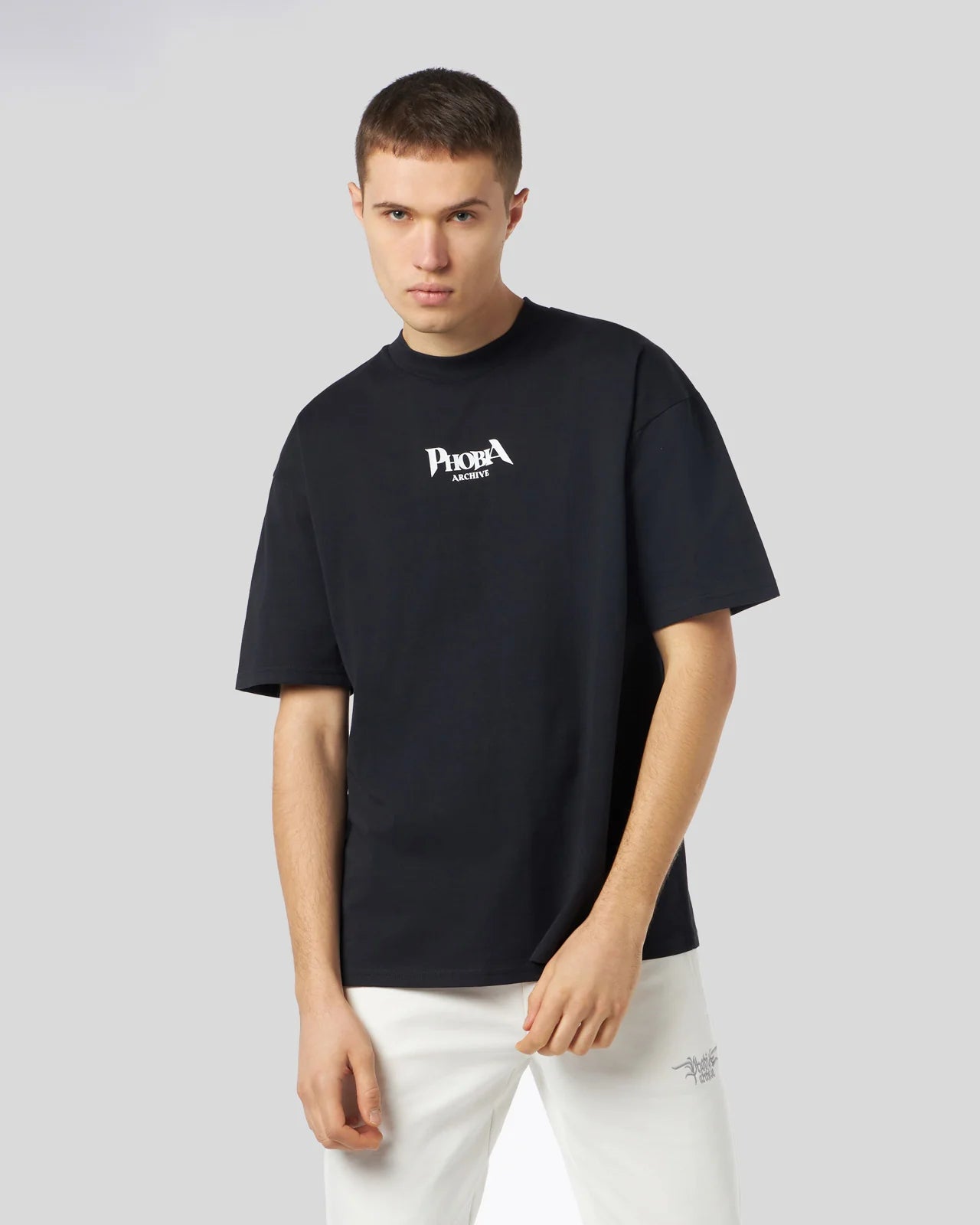 PHOBIA T-SHIRT NERA CON GRAFICA BAT EYE VIOLA